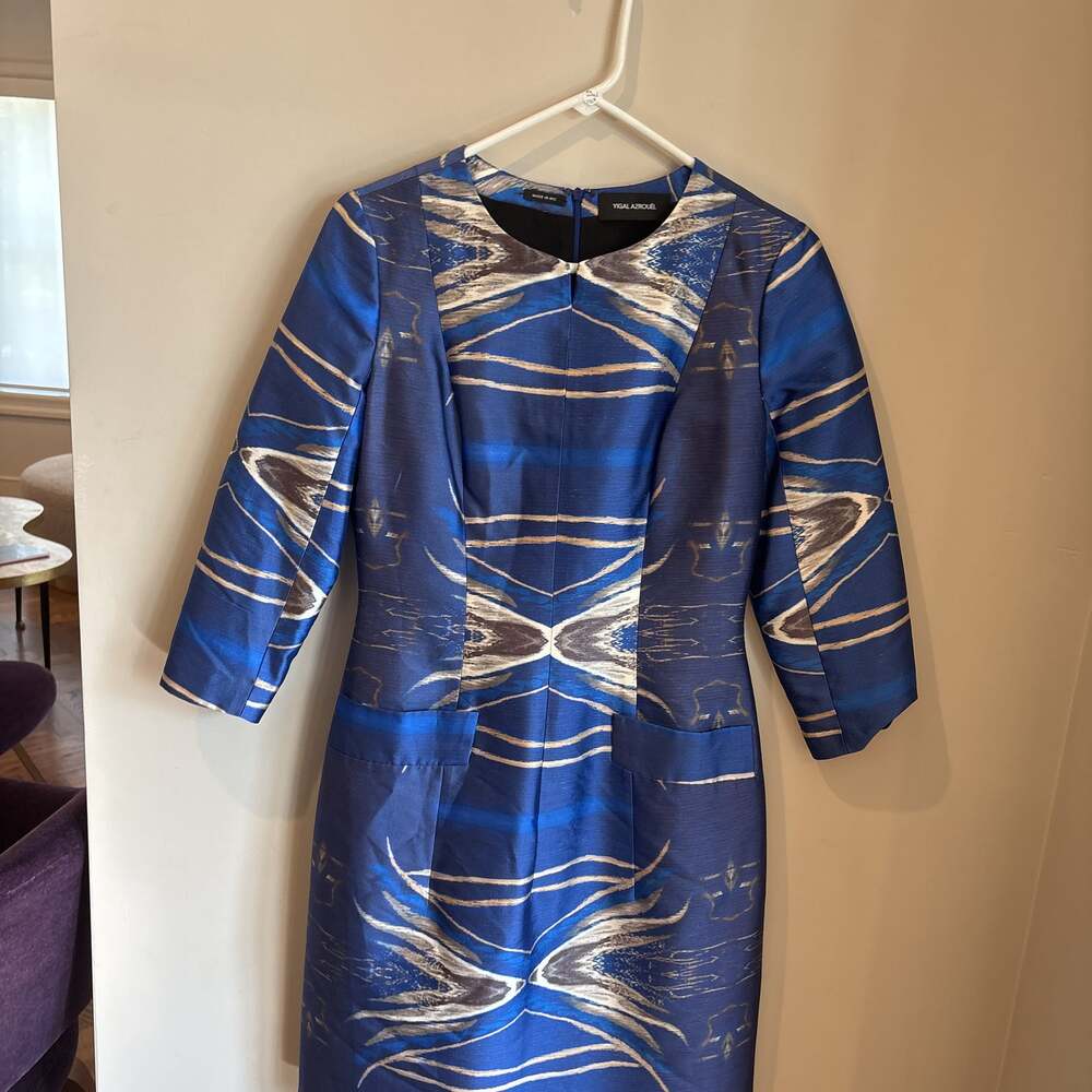 blue silk Yigal Azrouël dress with an abstract print.